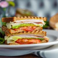 Tacchino · Mesquite turkey breast, romaine lettuce, fresh tomatoes and provolone cheese with our mayo m...