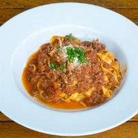 Bolognese · Certified angus beef slow cooked in Italian tomato sauce, with red wine and thinly chopped c...