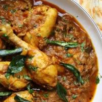 Chicken Curry · Boneless chicken cooked with herbs and spice mix.