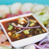 Todo Crudo · Shrimp, octopus, ahi tuna, scallops, seafood veggie mix