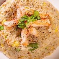 Crab Meat Fried Rice · Seasoned and made with eggs, and with crab meat
