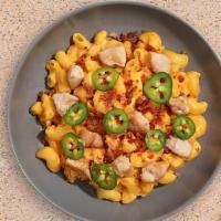 Take The Bacon Mac · Glorious premium chicken, bacon, cooked in a creamy cheese sauced and topped with jalapenos ...