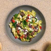 Pesto Mastah Mac · Made with fresh spinach, olives, mushrooms, and peppers cooked in a creamy blend of pesto an...