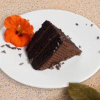Chocolate Supreme Cake · A slice of moist chocolate cake layered with chocolate frosting