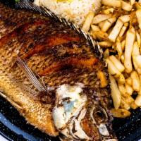 Mojarra Frita · Deep fried whole mojarra fish.