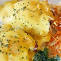 Eggs Benedict · Served w/ potatoes or hash browns.