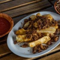 Yuca Frita · Fried with chicharon, curtido and salsa.