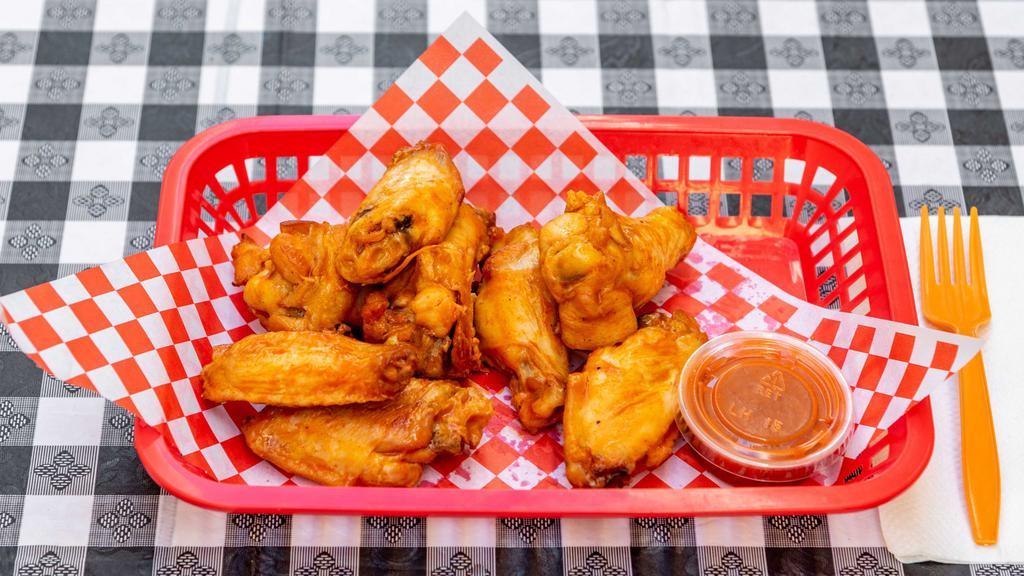Buffalo Wings · One dipping sauce included: Ranch, Blue Cheese, BBQ, or Cajun hot sauce.