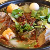 Spicy Beef Shank Stew Hot Pot(麻辣牛腩锅） · Ingredients: Beef stew, Mung bean sheet jelly, Quail eggs, Dried tofu, Seaweed, wood ear, Sl...
