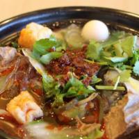 Sour & Spicy Glass Noodle Hot Pot(酸辣粉锅） · Mung bean sheet jelly, quail eggs, dried tofu, wood ear, seaweed, dried beancurd stick, gree...