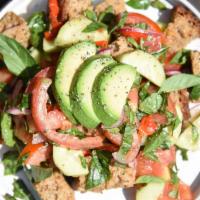 Panzanella (V) · sourdough, heirloom tomatoes, cucumbers, red onion, roasted red peppers, avocado, Kalamata o...