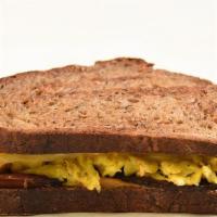 Breakfast Sandwich (Nf) · sourdough, scrambled eggs, bacon, cheddar, & chipotle mayonnaise
