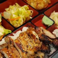 Bento Box A · Chicken teriyaki CA roll (4pcs), pot sticker (2pcs), rice, salad, veggie & soft drink or mis...