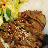 #9. Pork Teriyaki · Marinated w/ our special teriyaki sauce.