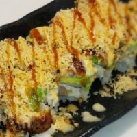 #121. Dragon Roll · Kani, shrimp tempura, avocado, unagi with crunchy and sauces.