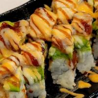 #124. Pink Lady Roll · Spicy tuna roll topped with avocado and unagi with sauces.