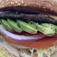 1/4 Avocado Cheeseburger · Burger with Cheese, Avocado, Lettuce, Tomatoes, 1000 Island Sauce, and Onions.