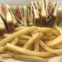 Club Sandwich · Sandwich with mayo, lettuce, tomato bacon, turkey with the choice of wheat or white or sourd...