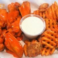 Chicken Wings Combo · Seven piece chicken wings, waffle fries with Soda and a side of ranch.