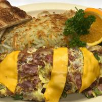#7 Super Omelette · Omelette with bacon, ham, and sausage with red onion, bell pepper, cheese inside and cheese ...