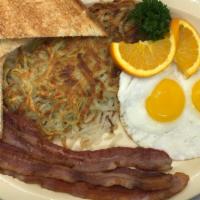 #2 Bacon And Eggs · 3 slices of Bacon with Eggs, hash brown, and two slices of toast(either white or wheat) with...