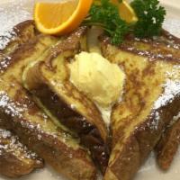 French Toast Only · Six pieces of French toast with powdered sugar, syrup, and slice of orange.