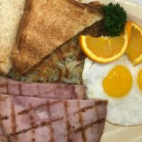 #9 Ham & Eggs · Two sliced hams with eggs, hash brown, and two slices of toast either white or wheat with tw...