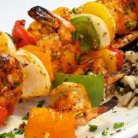 Shrimp Kebab · Plump, succulent grilled shrimp kebab. Add on any of our authentic sides and sauces and make...