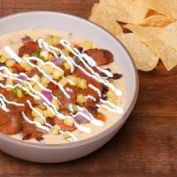 So Rich Loaded Queso · This queso packs a bold punch your taste buds won't forget! QDOBA's classic three-cheese que...