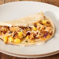 Single Gold Rush Taco · These tacos start with gooey 3-Cheese Queso layered in between 2 tortillas (flour or corn), ...