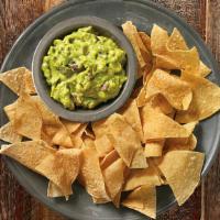 Hand-Crafted Guacamole & Chips · Hand-crafted guac made-in-house daily, served with freshly fried tortilla chips seasoned wit...