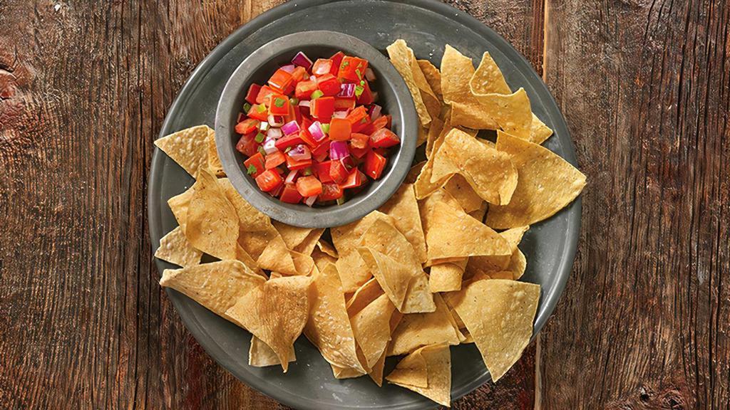 Salsa & Chips · Choice of salsa, served with freshly fried  tortilla chips seasoned with salt and lime.