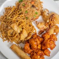 Combination Dinner A · Orange chicken and honey walnut shrimp. Served with egg roll, chicken fried rice or chicken ...