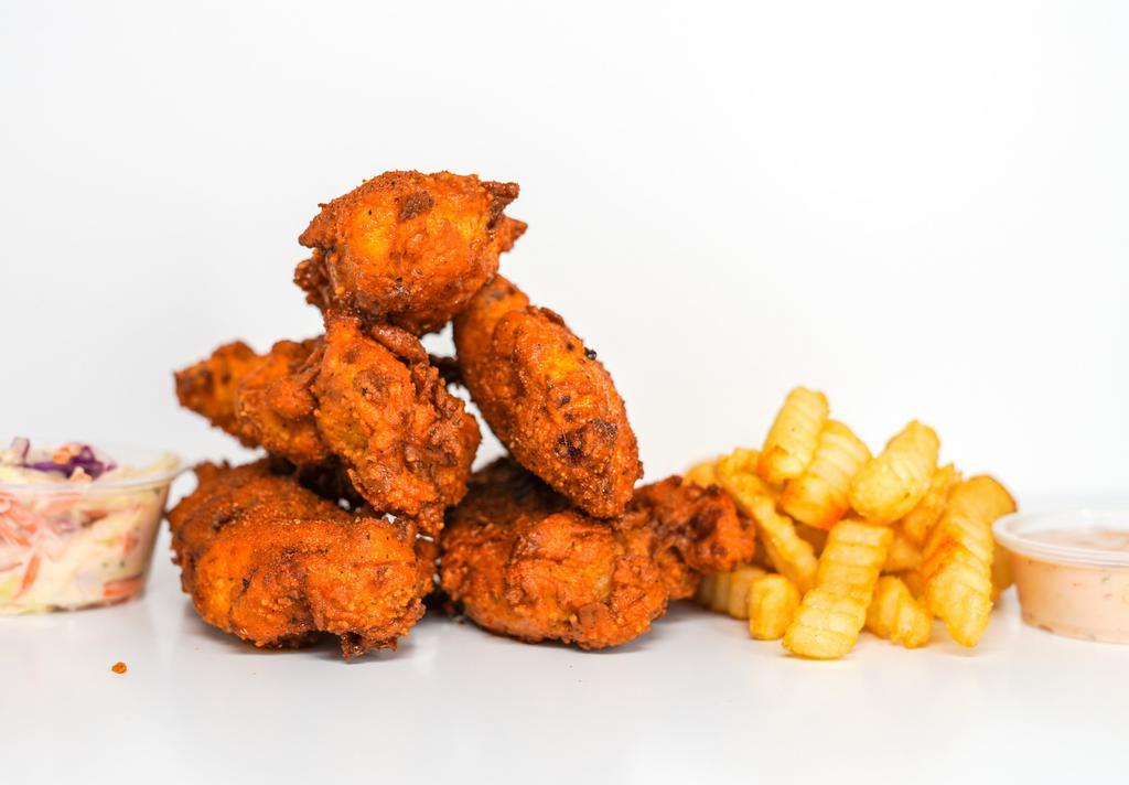 5 Piece Jumbo Hot Tender · 5 of our famous, jumbo, hand-breaded chicken tenders drenched in Nashville Hot Sauce. Choice of a side of our famous Special Sauce or Homemade Ranch Dressing