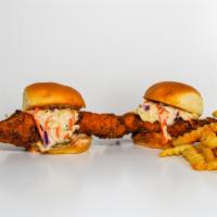 2 Sliders · 2 sliders made with our famous, hand-breaded, chicken tenders drenched in Nashville Hot Sauc...