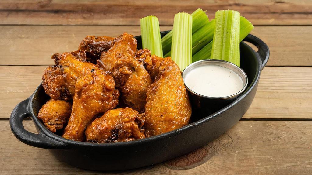 Wings Bone In Buffalo · Crispy bone-in wings, celery, smoked onion ranch (280 cal) or house-made blue cheese dressing (250 cal)