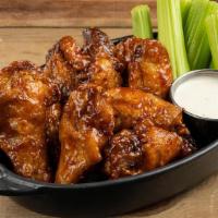 Wings Bone In Bbq · served with bone-in wings, celery, carrots, choice of house ranch (245 cal) or bleu cheese (...