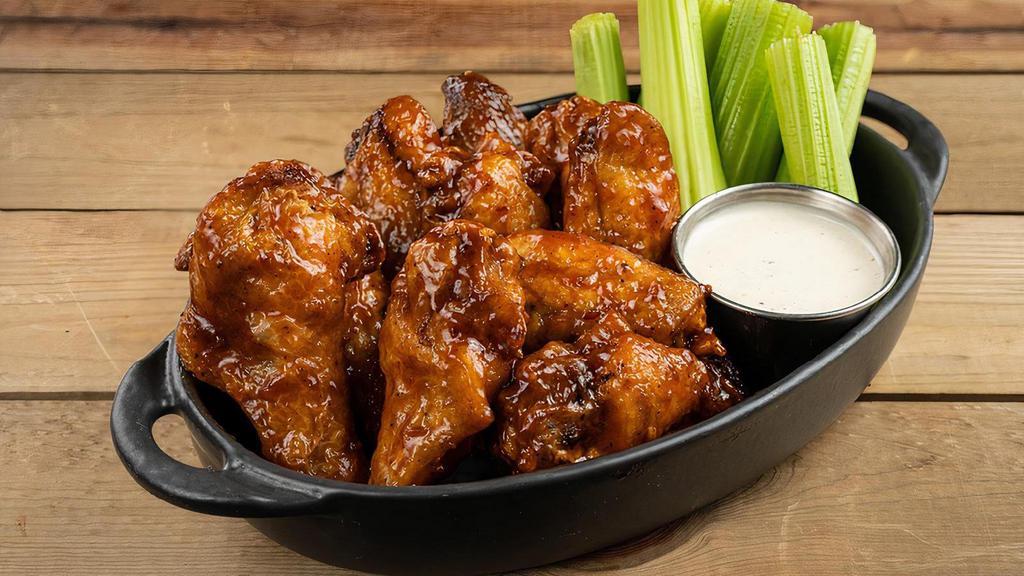 Wings Bone In Bbq · Crispy bone-in wings, celery, smoked onion ranch (280 cal) or house-made blue cheese dressing (250 cal)