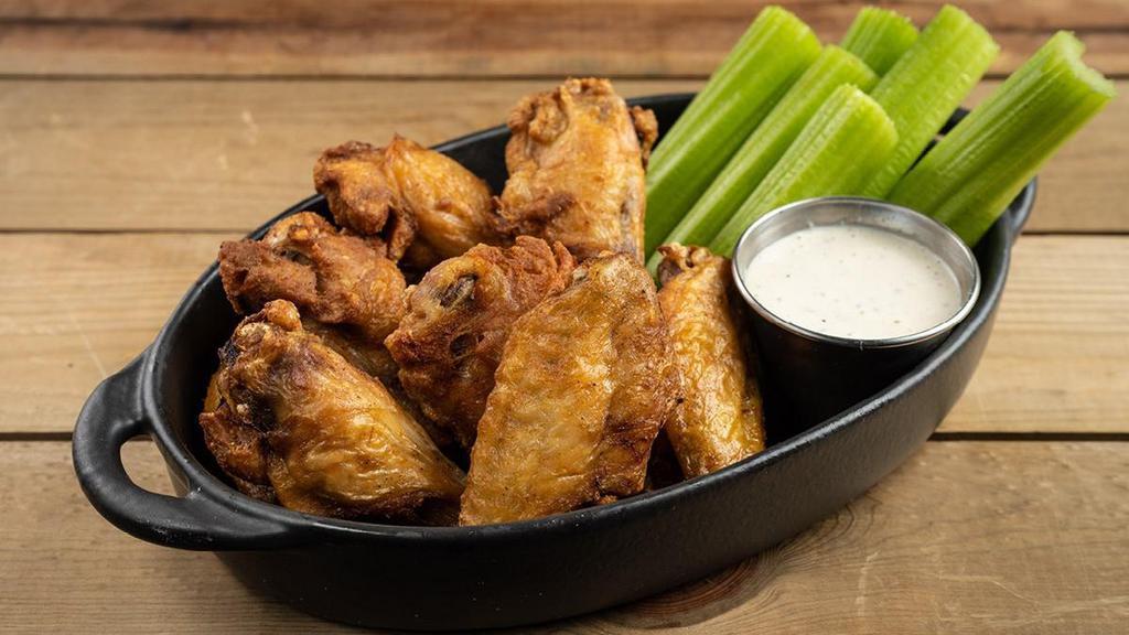 Wings Bone In Plain · Crispy bone-in wings, celery, smoked onion ranch (280 cal) or house-made blue cheese dressing (250 cal)