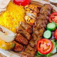 Mix Kebab · Combination of shish, beef, and chicken kebab. Served with hummus, garlic sauce, and choice ...