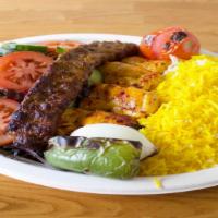 Combo Kebab · 1 skewer of chicken and 1 beef koobideh kebab. Served with hummus, garlic sauce, and choice ...