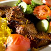 Shish Kebab · Juicy marinated chunk of filet mignon broiled on open fire.