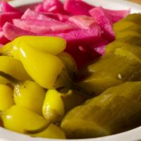 Mixed Pickle · Combination of pickles, pickled turnips, and spicy yellow peppers.