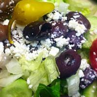Greek Salad · Romaine lettuce, tomato, cucumber, onion, feta cheese, Kalamata olives, and balsamic vinaigr...