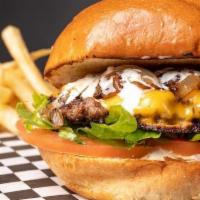Smash Cheeseburger · Smash Burger patty with smash sauce, American cheese, shredded lettuce, tomato, onion and pi...