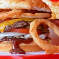 Bbq Bacon Cheeseburger · Smash Burger patty with bbq sauce, cheddar cheese, smoked bacon, crispy onion rings, shredde...