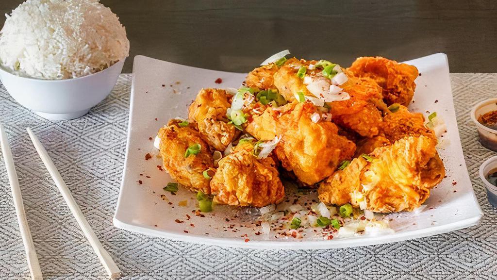 Salted Pepper Chicken Wings (12) · Crispy breaded chicken wings cooked with garlic, onion, and salt and pepper.