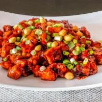 Kung Pao Chicken Dinner Size  · Chicken, green onions, and peanuts, cooked with sweet and spicy sauce. Served with steamed r...
