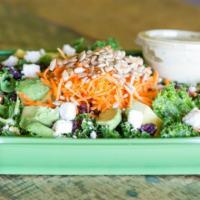 Kale Salad · Kale, avocado, feta cheese, dried cranberries, carrots, sunflower seeds tossed in tahini dre...