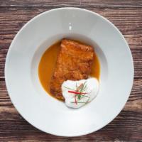 Salmon Panang · Deep fried salmon in traditional thai panang curry with bell pepper and kaffir lime leaves.